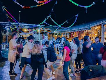 Viajero Hostels | Viajero Paracas Hostel | Night party at an outdoor restaurant at Viajero Kokopelli Paracas