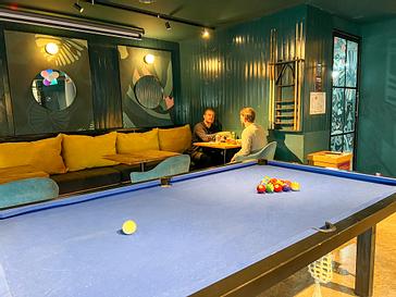 Viajero Hostels | Viajero Buenos Aires | Play area in Viajero Buenos Aires, with sofas for guests and a pool table.