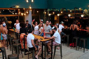 Viajero Hostels | Viajero Buenos Aires | Travelers enjoying the afternoon with activities in the bar and pool area, meeting new people and cultures at Viajero Hostel Buenos Aires.